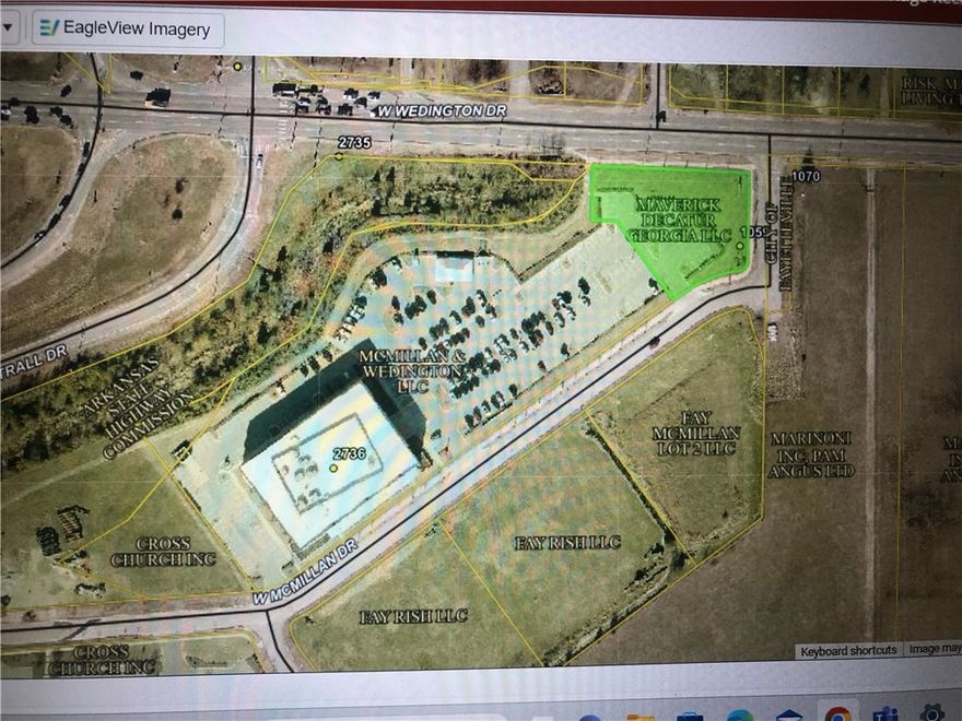 This is an empty lot; .65 acres. Property lines are marked. Perfect for a small business to set up shop.