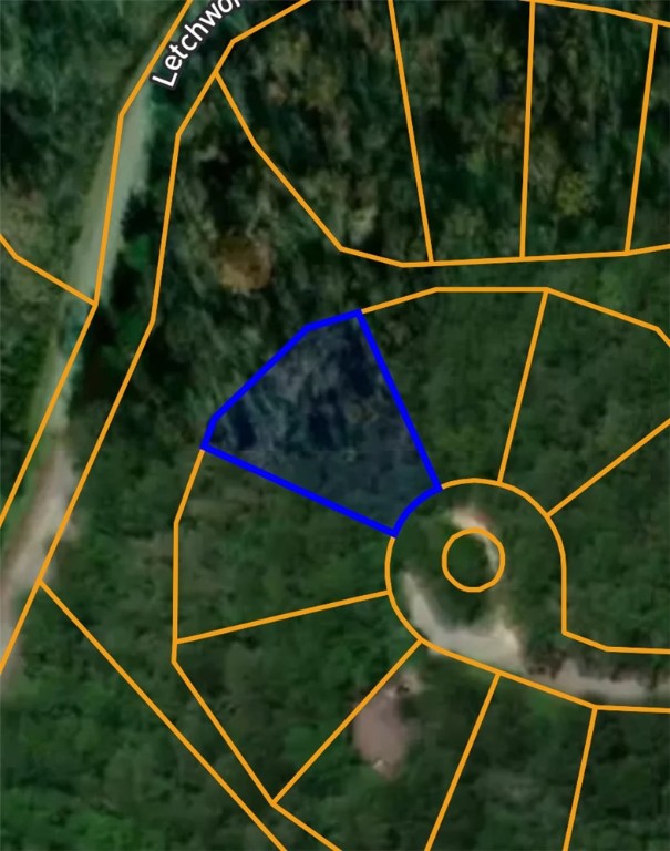 Build your dream home on this 0.29-acre lot nestled in the Granshire Subdivision of Bella Vista. Located on Letchworth Lane, this wooded property sits on a quiet cul-de-sac and offers privacy while remaining close to all the amenities Bella Vista is known for—trails, lakes, golf, and more. Situated in Benton County and within the sought-after Bentonville School District, this lot presents an excellent opportunity for investment or custom residential development.