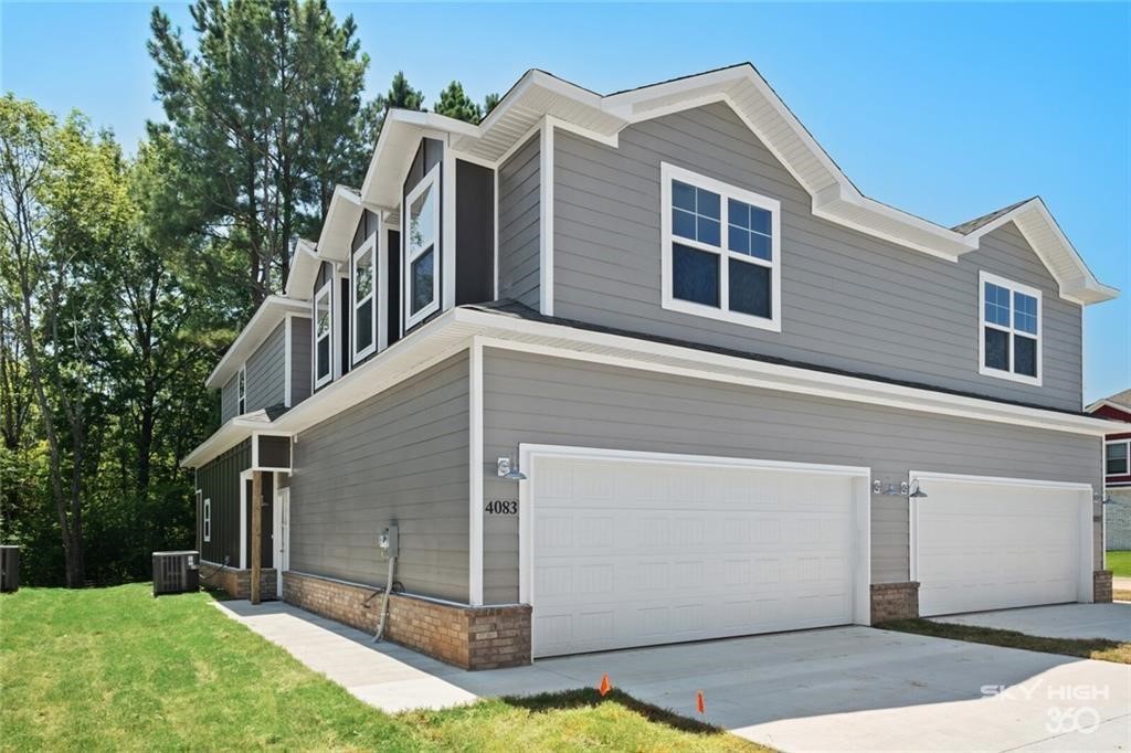 **Pre-leasing for Summer 2025** It doesn't get better than this luxury living! This beautiful home features: open concept living with lots of natural light, 3 bedrooms with en suite bathrooms upstairs and a half bath downstairs for common use, stunning granite countertops, covered deck, modern appliances, private garage access, and front covered entry. Stunning modern features are abundant throughout the home. Owner will supply a refrigerator, washer, dryer and lawn maintenance for easy tenant living. Perfect location for University of Arkansas Students with Razorback Transit Tan Line near by. Close to restaurants, shopping, and activities, this rental is all you could ask for and more! Multiple 4 and 3 bedroom units available. Units may differ in color of finishes. Leases to start in August.