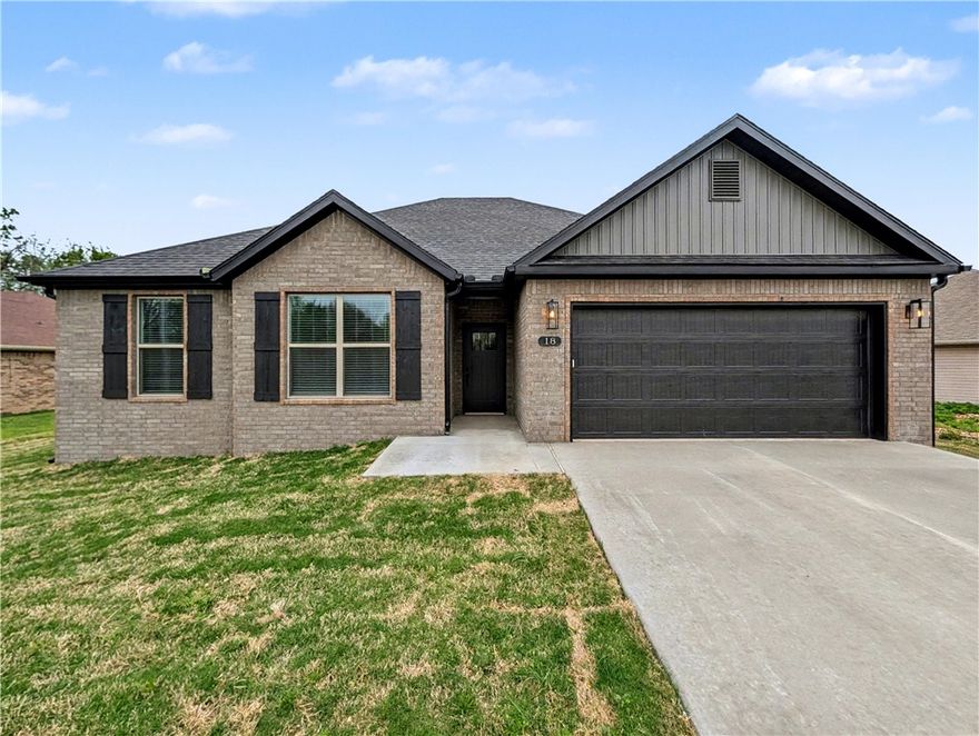 Welcome To Your Next Home! This Beautiful New Build Has Style, Function, And That "Feels Like Home" Energy From The Moment You Walk In. The Vaulted Living Room With Beam Accents Adds Warmth And Character, Flowing Seamlessly Into An Open Kitchen With A Large Island, Quartz Counters, Custom Cabinets, And Great Natural Light. The Split Floor Plan Keeps The Primary Suite Private With A Spacious Bath And Walk-In Closet, While The Additional Rooms Offer Flexibility For Family, Guests, Work, Or Play. Step Outside To A Covered Back Deck Overlooking A Super Flat Backyard, A Rare Find In Bella Vista! Convenient Location With Easy Access To I-49, Shopping, And Dining While Still Offering The Peaceful Setting You've Been Looking For. No Pets. Background And Credit Check Required.
