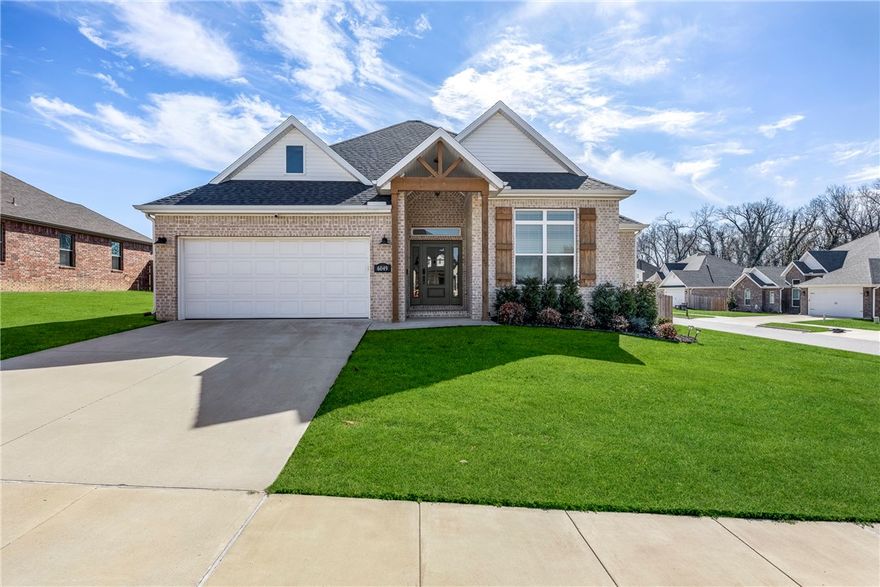 If you've been looking for newer construction without the wait...this is it! This move-in ready home in Woodridge Subdivision is only three years old and full of great features! The split floor plan offers 3 bedrooms, 2 baths, 10' ceilings, arched doorways, and a bright, open feel throughout. You'll love the spacious living room with gas fireplace, the primary suite with a cathedral ceiling and wood beams, plus walk-in closets in every bedroom. The kitchen includes upgraded stainless appliances, granite countertops with a Samsung refrigerator, washer and dryer conveying with accepted offer. Extras include a garage with an expoxy-coated floor, water softener, attic storage, covered patio, privacy-fenced backyard, and a corner lot location.