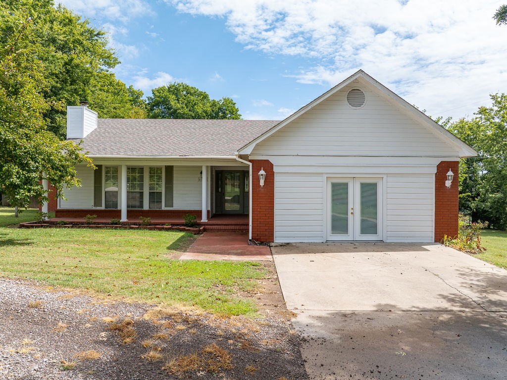 Well maintained 3-bedroom, 2-bath home with a versatile flex space—perfect as a 4th bedroom, home office, playroom, or home gym! Step into the inviting living room with gleaming hardwood floors, soaring vaulted ceilings, and a cozy fireplace flanked by built-in shelving—a perfect gathering space for family and friends. The light-filled kitchen features extensive cabinetry, neutral countertops, and matching appliances, including a double-door refrigerator. A recent coat of paint inside and out gives the entire home a crisp, clean look. The private master suite is a standout with dual walk-in closets and ample space to unwind. Enjoy outdoor living with a large back deck, covered front porch, and a fully privacy-fenced backyard, ideal for entertaining or relaxing. And the best part? You're just 30 seconds from interstate access, making commuting a breeze!