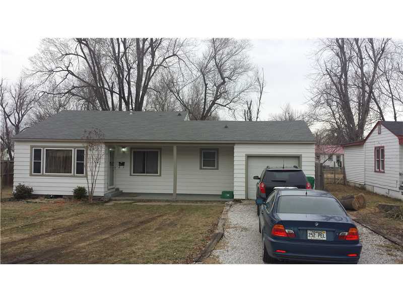 Refinished hardwood floors, remodeled bathroom, back yard privacy fence, storage building.