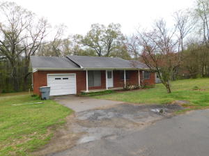 Brick home on 6 lots in Dardanelle Heights! Repair and reap the rewards!