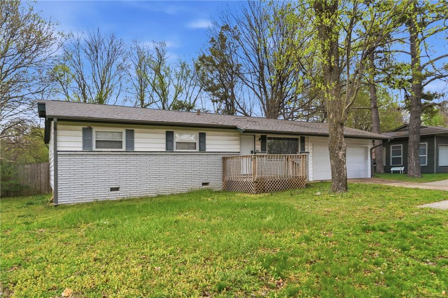 Opportunity awaits at 2908 W. Mount Comfort Rd in Fayetteville. This home is a solid option for investors or a future homeowner. Located a 1/2 mile from I-49 and approximately 3 miles from the University of Arkansas. Offering 3 bedrooms, 1.5 baths, and a 2-car garage, this property sits on a flat 0.30-acre lot with a large backyard ideal for outdoor enjoyment or future possibilities. Currently leased at $1,750/month through April 30, 2026.