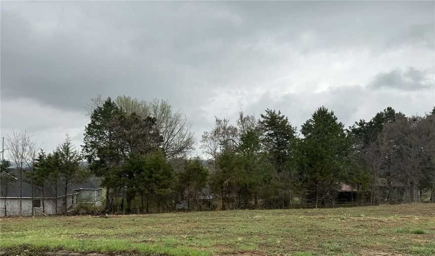Build the home you've always envisioned on this beautiful 0.26-acre lot nestled in the serene Magnolia Ridge Estates community in Russellville. Enjoy the rare combination of a peaceful, quiet neighborhood that feels like a country retreat — all within the convenience of city limits.

This ready-to-build lot comes fully equipped with city water, sewer, and electric already on site, so you can break ground without delay. Whether you're dreaming of a sprawling custom home or a cozy retreat, this lot offers the space and setting to bring your blueprints to life.

Don't miss this opportunity to plant your roots in one of Russellville's most inviting neighborhoods — the only thing missing is you.