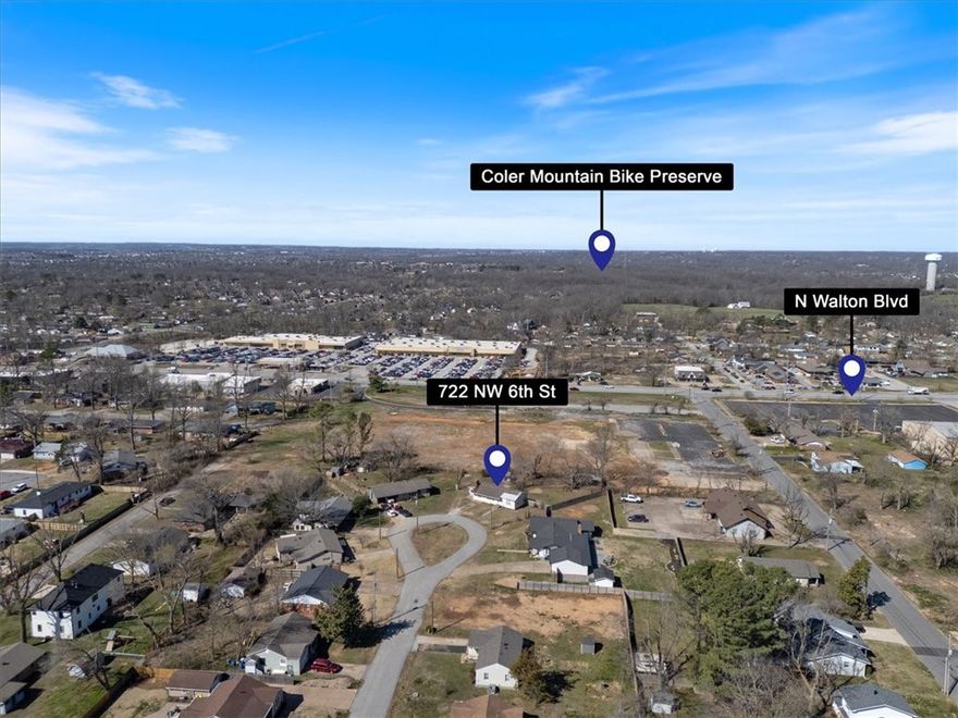 One mile from Downtown Bentonville! Close to Biking trails and shopping in Downtown Bentonville. Hard to find home on a huge lot in Downtown Bentonville. This property has two outbuildings one is 12x24 and the other is 10x10.
