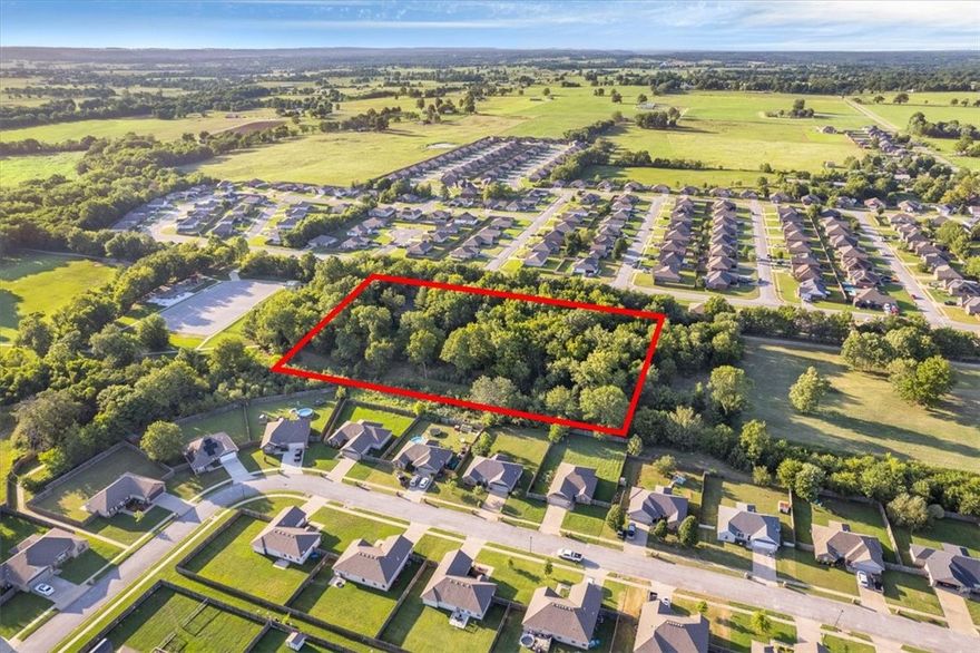 Location, Location, Location! This 4 acre mol property is located in a highly desirable area of Prairie Grove. The property butts up to beautiful Muddy Fork Park allowing for easy access to the playground, dog park, and walking trails. Ideal location to build your new forever home! 2 septic systems on site, Electric on site, public water has been ran to the property. Mobile home and carport to convey in current condition with no seller repairs or improvements. Schedule your showing today!