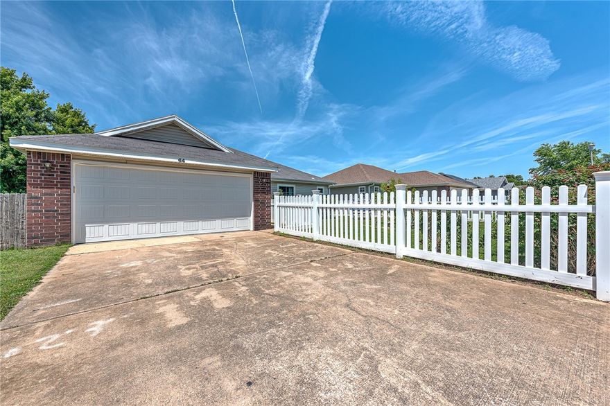 WELCOME TO THIS 3 BED/2 BATH LITTLE BEAUTY COMPLETE WITH THE MOST CHARMING WHITE PICKET FENCED YARD THAT WHISPERS….WELCOME HOME!!  Lots of updates in this cozy, chic and inviting home featuring an open living area with fireplace that walks out to a large patio and deck space featuring a retractable awning creating a beautiful space for entertaining and just relaxing…plus plenty of fenced green space for kids and pets!  Great open eat-in kitchen offers high end stainless appliances with pantry!  New paint, flooring, light fixtures and more!!  Located in the heart of Bentonville, you are just minutes from Downtown Bentonville where you can enjoy shopping, dining, entertainment, First Friday, Farmer’s Market and more!  Enjoy being close to endless mile of mountain biking trails!  Don’t miss out on this incredible opportunity to come smell the roses in your own private rose garden and make this property your home!!