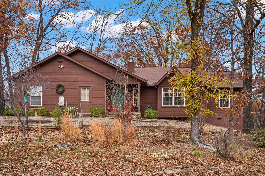 Sellers are offering a $3,000 buyer credit toward cosmetic updates, making this home an incredible opportunity to customize into your dream space. Youāll love the retreat-like 0.44 acres with stunning views, a maintenance-free yard, and unbeatable proximity to outdoor adventures. A short bike ride to the Back 40 Trails and Blowing Springs Greenway, this home is perfect for nature lovers and is just a few miles from Cooper Elementary.
Other features include a climate-controlled partial basement, ideal for a workshop, studio, or office. Inside, enjoy high ceilings, a skylit kitchen with spacious countertops overlooking the woods, and a large living room with built-in storage throughout. The oversized garage provides extra storage with a closet and attic space, and the 16x24 ft deck is perfect for relaxing and enjoying serene forest views.
Be sure to take advantage of Bella Vistaās amenities, including golf courses, parks, and swimming pools. (two photos have been edited & virtually staged)