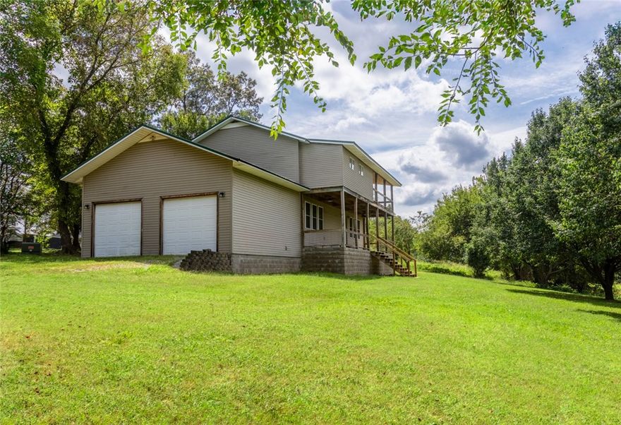 Highly motivated seller! Nestled on a serene 1-acre lot in Bentonville’s tranquil Osage Hills, this 4-bedroom, 2.5-bathroom home offers a peaceful retreat with immense potential. Tucked away from the hustle, it exudes warmth, ideal for those seeking privacy and a chance to create their dream home. Spacious, light-filled living and dining areas offer ample space for family gatherings, cozy evenings, or entertaining guests. The versatile layout is a canvas for your vision, perfect for updates or custom touches, with a seller-provided home warranty up to $795 for added peace of mind. Aviation enthusiasts will love relaxing on the expansive back porch, watching planes soar near XNA, just under 3 minutes away. Outdoor lovers are steps from world-class biking trails like Slaughter Pen and Coler Mountain for endless adventure. A short drive to Bentonville’s vibrant dining, arts scene, and Crystal Bridges Museum blends seclusion with NWA’s cultural pulse. Seize this rare opportunity—schedule your private tour today!