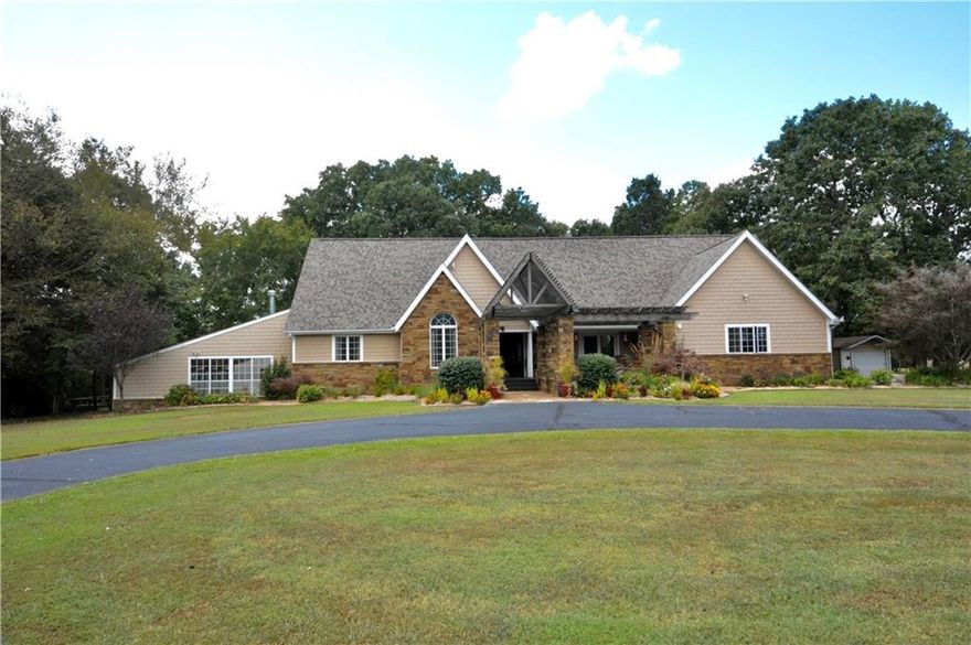 This gorgeous estate property offers privacy and seclusion on 76.63 acres. Meticulously cared for, the 2-story home features wood floors throughout with a large kitchen and formal dining area, 2 home offices, and the spacious bedrooms offer walk in closets. Interior and exterior updates include a new roof in 2020, additional wood-burning source for HWH & furnace system, high efficiency 2016 HVAC, and solar panel system. Plenty of storage is available with a 6-Bay detached garage, and attached 2 car garage, and entertainment is found everywhere from the wonderful indoor pool, to the ATV trails, Disc Golf and 2 ponds on the property.