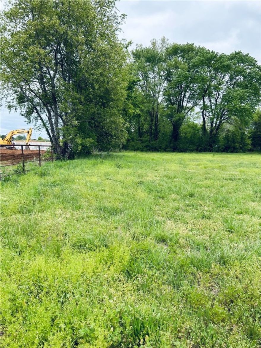 Rare opportunity, 4.85 acres in developing area, all utilities available, commercial area, street frontage access and street access to rear of the  property. Located in commercial district of Centerton, highway 102 frontage. Rapidly developing area, adjoins largescale development. Suitable for business, storage units ,restaurant, strip shopping, town homes or apartments, etc. Small area crossing the front of the property is included in 100 year flood plan. That area can be used for parking lot.
