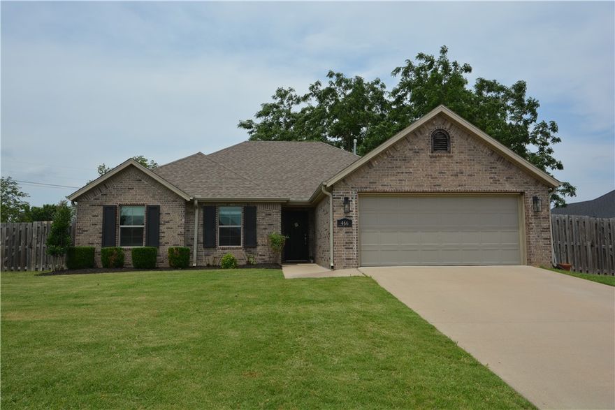 Located in Saddlebrook S.D Wonderful  3 bedroom , 2 bath  home that has been well taken care of . This home features LVP wood flooring in living room, entry , kitchen , breakfast area & primary bedroom . Large  living room features  vaulted beamed ceiling  and  gas fireplace  Split bedroom floorplan offers privacy with two additional bedrooms on other side of home . Spacious primary bedroom & bath with double closets , whirlpool tub & separate shower . Outside includes   covered back patio ,  with lots of nice landscaping  and  large fenced back-yard  located in a great neighborhood in Farmington . Quick access to schools , shopping & restaurants .  Kitchen fridge , washer/dryer , curtains and curtain rods "Do Not Convey "