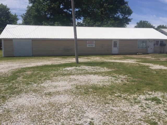 Great location for small business just off 412 W. behind an eye clinic, property is 2 parcels of land 1.27 acres previously used for a refrigeration business zoned C-2. Office space is 22x29, warehouse space is 58x29; behind main building is a 20x32 building with roll-up door.