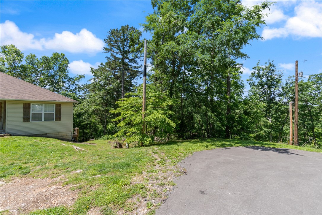 Buildable .29 acre lot. Enjoy all the amenities Bella Vista has to offer. Back 40 trail nearby for the bike enthusiasts.