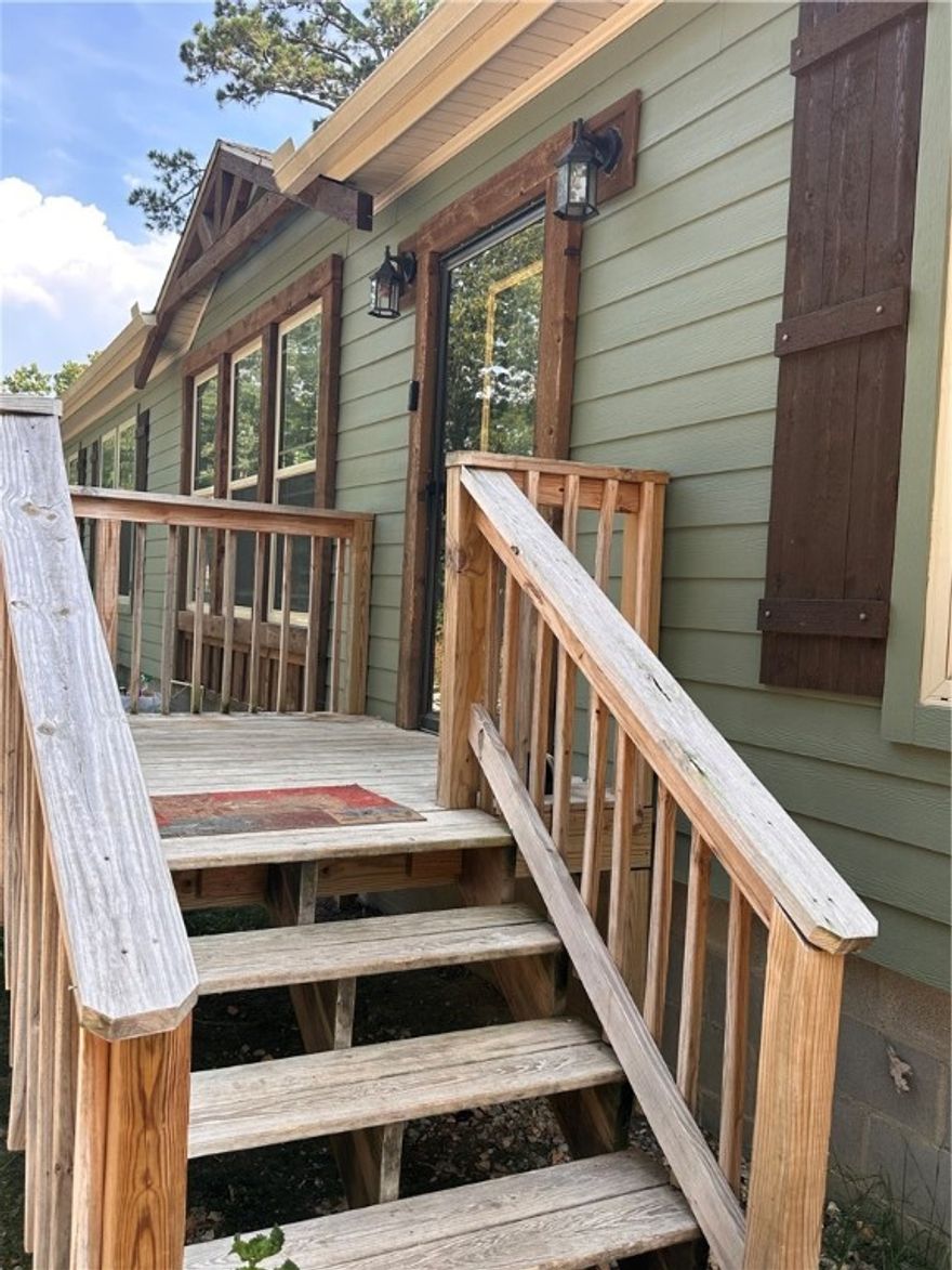 2022 Modular home with several upgrades. Located on 10.61 wooded acres. Bank owned property with  some landscaping done.  With a full price offer Seller will replace all major appliances taken by previous owners. Cleaning and minor repairs are being done to this home.  Only minutes to Starkey Marina and Beaver Dam. Owner will refinance to qualified buyer.  Inside home is a nice surprise with Open split  Floor plan and large walk in shower and soaking tub in main bedroom suite.  RV Electric and septic hookup.  Enough room at end of ridge for another home or rental cabin.