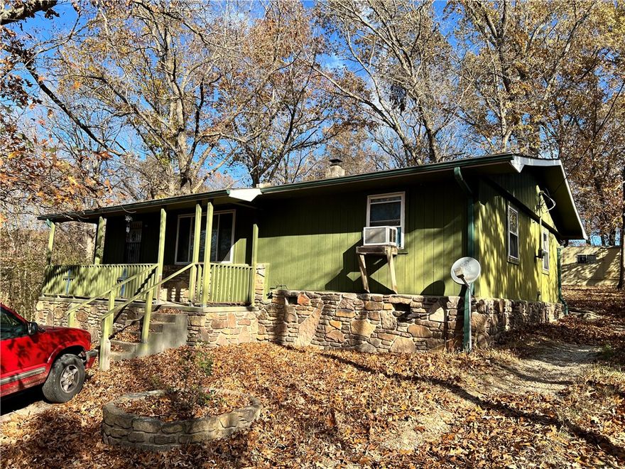 Cozy country home in a great location! This 1260 sqft home boasts 2 bedrooms, 1 full bath with double vanity, and large utility room. In a peaceful setting on 3.16 mostly wooded acres, yet only 1/4 mile to Hwy 412. Property has a well, owned propane tank, and storm cellar. Near the necessities and 15 minutes from Huntsville. Schedule your showing today! Utility availability is the responsibility of the buyer or buyers agent.