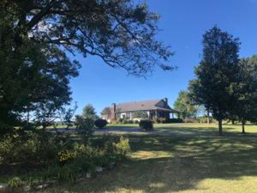40 acres more or less with two houses, two barns and heated and cooled workshop, greenhouse, pond, creek, pasture, fenced, gorgeous manicured property close to town.  Realtor owned.  Sold before entering in MLS.