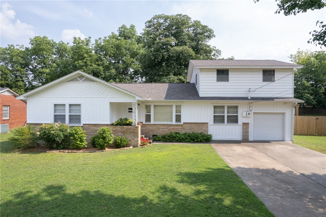 Welcome to your dream home in Fort Smith! This stunning 5-bedroom, 3-bathroom gem boasts the timeless beauty of original hardwood floors, adding a touch of elegance to every step you take. Surrounded by majestic, mature trees, this residence offers a peaceful retreat from the hustle and bustle of city life. There's plenty of space for everyone in the family to relax and unwind. Best of all, this home is move-in ready, saving you time and effort in settling into your new abode. Don't miss out on the opportunity to make this house your forever home!