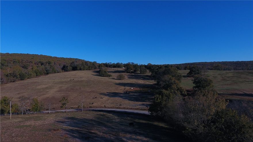 Cattleman's dream.  Mostly Pasture land with bottom areas bordered by Evansville Creek on the South, crossing Hale Mountain Rd to the remainder of the pasture land extending northward over Anderson Mtn.  Over half cleared land with rural water and fiber optic on the road, multiple springs and cross fenced.  Acreage can hold 2.5:1 cows and produce 500-600 bales.