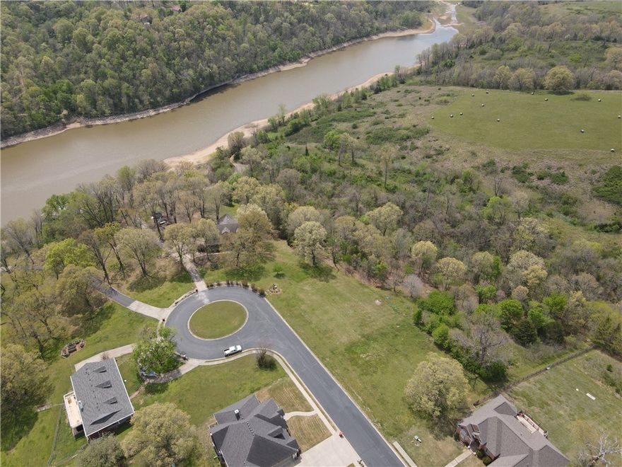 Build your dream home on this 1.17 acre lot with seasonal Beaver Lake views! Nestled at the end of a quiet cul-de-sac in a one street subdivision, this partially cleared/wooded homesite offers privacy, room to explore, and a scenic wooded backdrop. Enjoy neighborhood lake access along with the perfect setting for everyday living and lasting​​‌​​​​‌​‌​​​‌‌​​​‌‌‌​​‌​​‌‌​​​​ memories.