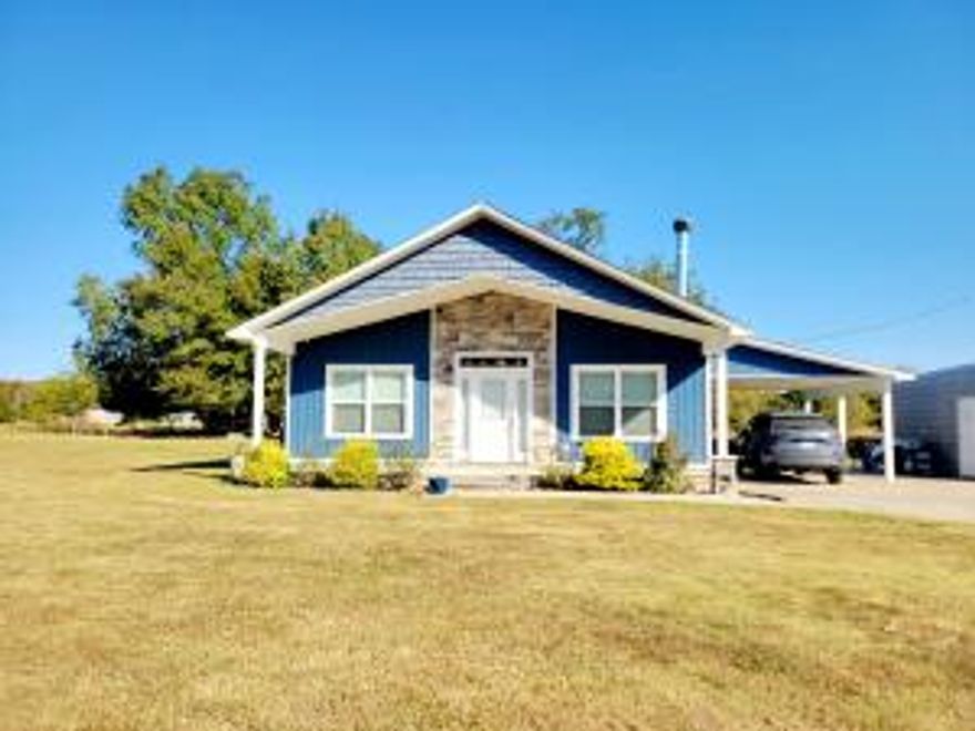 &#127969; Charming Beach-Style Home on approx. 1.81 Acres &#127754; This 2-bedroom, 2-bath home combines coastal charm with modern comfort. Open-concept design with plenty of natural light. Gourmet kitchen with soft-close cabinets and a waterfall countertop island. Tankless hot water heater for endless hot water.AC system equipped with a surge protector for reliability. Fruit orchard with apple, pear, and peach trees, along with grape vines. Garden area & also an area featuring raised beds and a dedicated food plot for deer. Storm cellar for added peace of mind. 16x20 shop building for storage or projects. RV hookup with 30 or 50 amps, also water and septic. Close to Lake Atkins.