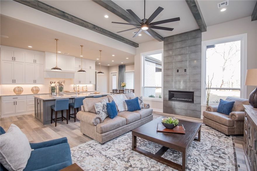 New construction modern home with gorgeous exterior in sought after community of Aurora on an East facing lot. Enjoy the stunning living room with custom beams, tiled linear fireplace, tons of light streaming through ample amount of windows and open floorplan. Kitchen features large island, stainless steel appliances, gas cooktop, custom cabinets, double ovens, massive walk in pantry and storage! Home also features a 5th bedroom on the main level that would also be perfect for a study. Spacious, private master bedroom with luxurious master bathroom. Master bath with double sinks, storage, walk-in tile shower and stand alone soaking tub. Upstairs features three large bedrooms with walk in closets and a bonus room. Huge covered patio overlooking the large lot perfect for entertaining! Aurora residents have access to TONS of community amenities. Adult pool, family pool, bike repair station, dog park, elevate fitness course, sports court, open air clubhouse and playground! Internet included in POA!