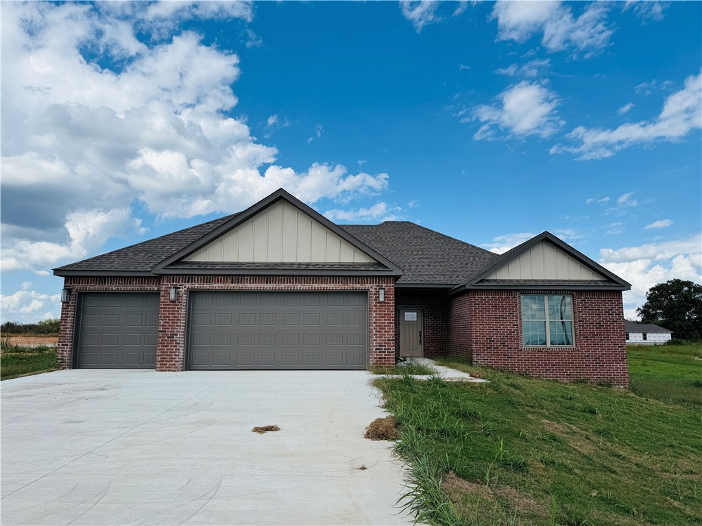 Enjoy the perfect blend of peaceful country living with convenient access to town! This stunning 4-bedroom, 2.5-bath home sits on a spacious 1-acre lot with a 3 car garage, offering privacy and tranquility, approximately 12 miles (20 minutes) to Walmart Home Office in Bentonville, and about 17 minutes to Northwest Arkansas National Airport (XNA). With 2,204 sq ft of beautifully designed living space, this home features an open floor plan, high-end finishes, and modern touches throughout. Don't wait, schedule your private showing now. You're going to love this new build, pristine home that's waiting for you!