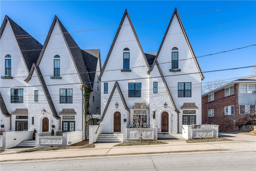 Welcome to urban living at its finest! This 3-bedroom, 3 1/2-bath townhouse in downtown Fayetteville is a true gem. Located just half a block from the vibrant Dickson Street and a short stroll to Block Ave., the historic square, performing art centers, Fayetteville Public Library, U of A, and the Razorback Greenway, this property offers the epitome of convenience. Perfect for entertaining, the home boasts two living areas and a stunning kitchen featuring stainless steel appliances. Enjoy your morning coffee or evening cocktails on the beautiful front porch, or take the festivities to the deck off the primary bedroom on the second floor – ideal for your grill and fire pit gatherings. The townhouse is not only stylish but also practical, with a rear-loading 2-car attached garage ensuring your vehicles and bikes are secured. With a prime location and thoughtful design, this residence is a rare opportunity to embrace the vibrant lifestyle of downtown Fayetteville. Don't miss your chance to call this urban oasis home!