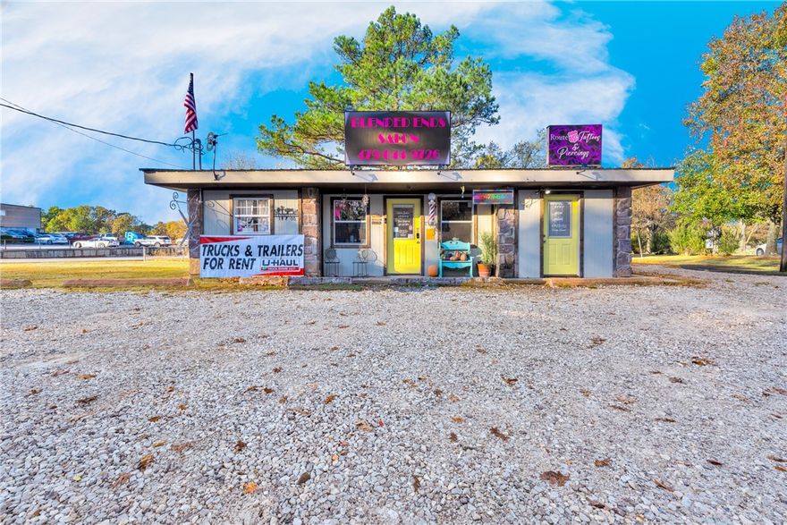 Over 80 feet of road frontage and industrial zoned building just north of Gravette’s commercial stretch on Highway 59. Brand new radiant heating system and electric HVAC in 2025. Traffic count is an estimated 6,100+ per day. Gravette continues to grow with a population increase of 6.84% since 2020. Property located just minutes to downtown Gravette and currently utilized as a hair salon. Industrial zoning: permitted use includes storage, assembly and manufacturing. Could be utilized for ofice, retail, or professional services.