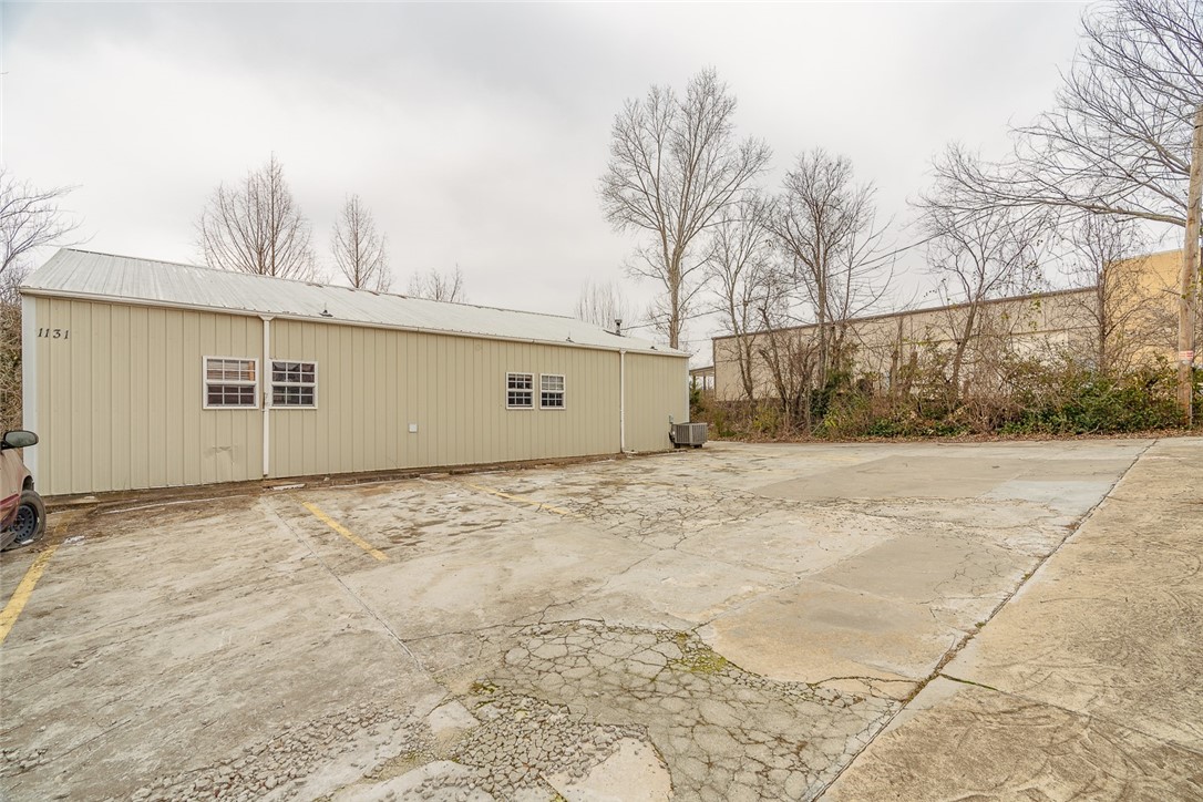 Spacious commercial space with great potential! Space consists of multiple larger spaces with wall cabinets, several smaller offices, as well as his and hers bathrooms and a shower. Would be perfect for a smaller manufacturing office, IT or Service based businesses, and much more. Gross lease term of minimum 2 years.