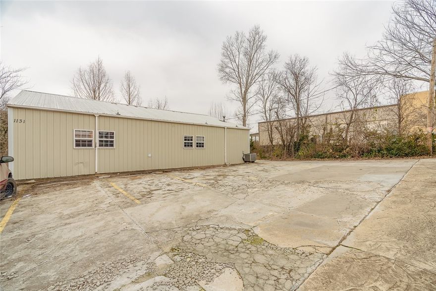 Spacious commercial space with great potential! Space consists of multiple larger spaces with wall cabinets, several smaller offices, as well as his and hers bathrooms and a shower.  Would be perfect for a smaller manufacturing office, IT or Service based businesses, and much more. Gross lease term of minimum 2 years.