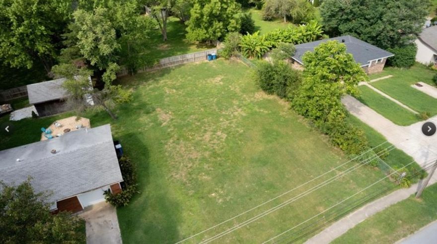 READY TO BUILD! Premium building lot in downtown Bentonville! Cleared and ready for your dream home! Walk or bike to the Bentonville Square, Lawrence Plaza, Orchards Park, Crystal Bridges, The Momentary, the Walmart Home Office campus…and more! Bentonville is one of the fastest growing, thriving communities in NWA celebrating art history, culinary exploration, health and wellness, outdoor recreation and so much more!  Step outside your front door to shop award winning farmers markets, quaint boutiques, stroll beautiful parks and trails and immerse yourself into the culinary scene! This opportunity won’t last long! Note: images with house renderings are for marketing purposes only.