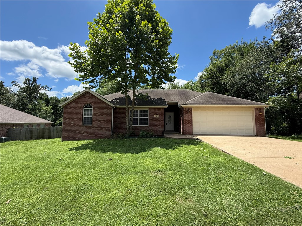 Welcome Home! This great 3 bedroom 2 bath home in Bella Vista is ready for you! This home features granite countertops, fireplace, spacious master suite, large and fenced in backyard with wood deck, 2 car garage and washer/dryer convey! Enjoy being minutes to I49 and Loch Lomond! Priced to sell, come see it today.