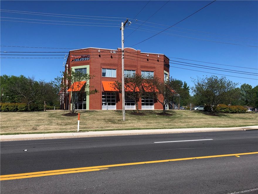 1201 S Walton Blvd. is a two-story, retail and office building with 18,984 SF on 2.01 +/- acres.  Located one block from Walmart Home Office campus along with new parks, attractions, downtown Bentonville and the future 350-acre Walmart Home Office campus . The property has 79 parking spaces with the first floor front-facing suites having roll-up doors. The property is fully leased but still provides significant opportunity for rent increases in the high-growth area of west Bentonville, the cultural heart of the market.
S. Walton Blvd is located is in the direct path of growth with new developments of retail, community parks and road improvements. The property is in the prime retail and commercial corridor of Bentonville and positioned to capitalize on the growth and excitement surrounding the 350-acre Walmart Home Office campus located approximately 0.5 miles east.