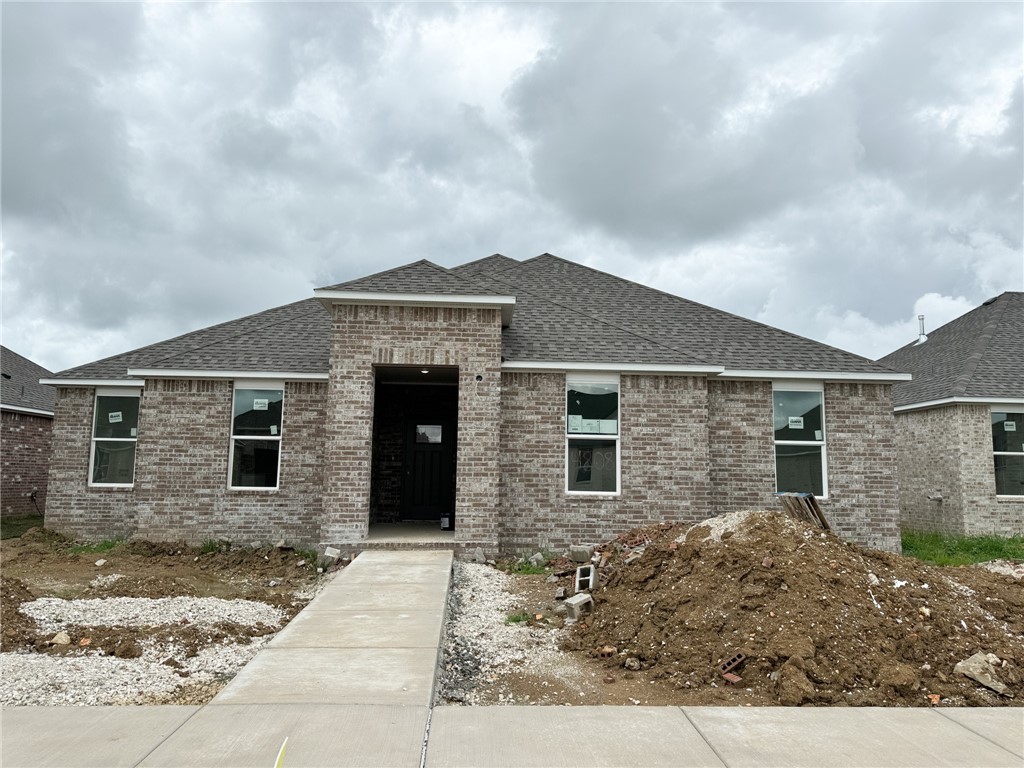 1694 Plan with 1739 Square feet in The Element Phase 3! Experience all that Fayetteville has to offer while living in a brand new home in The Element which is just off of Broyles Road in Fayetteville. These homes will be 4 sided brick ( per plan). Architectural shingles! Lovely kitchen with quartz countertops and backsplash! 42 inch cabinets! Master bathroom will have a fabulous en-suite with oversized walk-in shower! Flooring will be LVP and Carpet. Craftsman style front door with glass insert! Rear load garages
