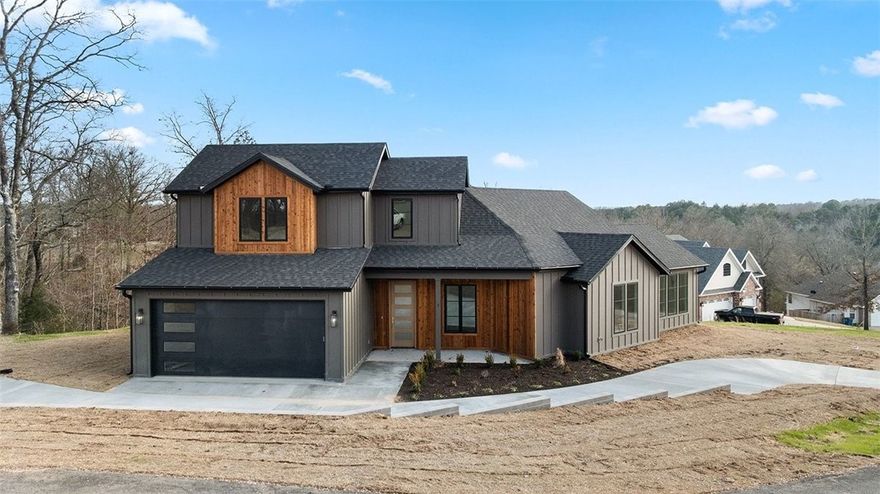 Beautiful new construction home on almost 1/2 acre lot.  Home has three bedrooms and two 1/2 baths with large open kitchen / living room space for friends and family! Master has a large walk-in closet and master bath which includes a deep soaking tub and extra storage. House features large covered back patio for all your entertainment needs or just a quiet evening.  Home is in a quiet area with easy access to shopping, one of the many gold courses in Bella Vista and all the other features available in Bella Vista.