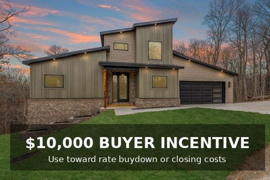 Welcome to 20 Yarrow Lane — a thoughtfully designed contemporary home offering comfort, light, and modern living. Ideally situated on a quiet cul-de-sac near Loch Lomond, this property provides both convenience and privacy, backing to POA land for a peaceful wooded backdrop. The well-planned layout features a private primary suite on the main level, with two additional bedrooms and a versatile flex space upstairs. The open-concept living area is bright and expansive, highlighted by soaring ceilings and abundant natural light, while clean lines and modern finishes create a warm, livable feel. Prewired for sound and security, this home is ready for today’s connected lifestyle, and a one-year builder warranty is included for added peace of mind. Seller is offering up to $10,000 in buyer concessions, which may be used toward closing costs or a rate buydown.