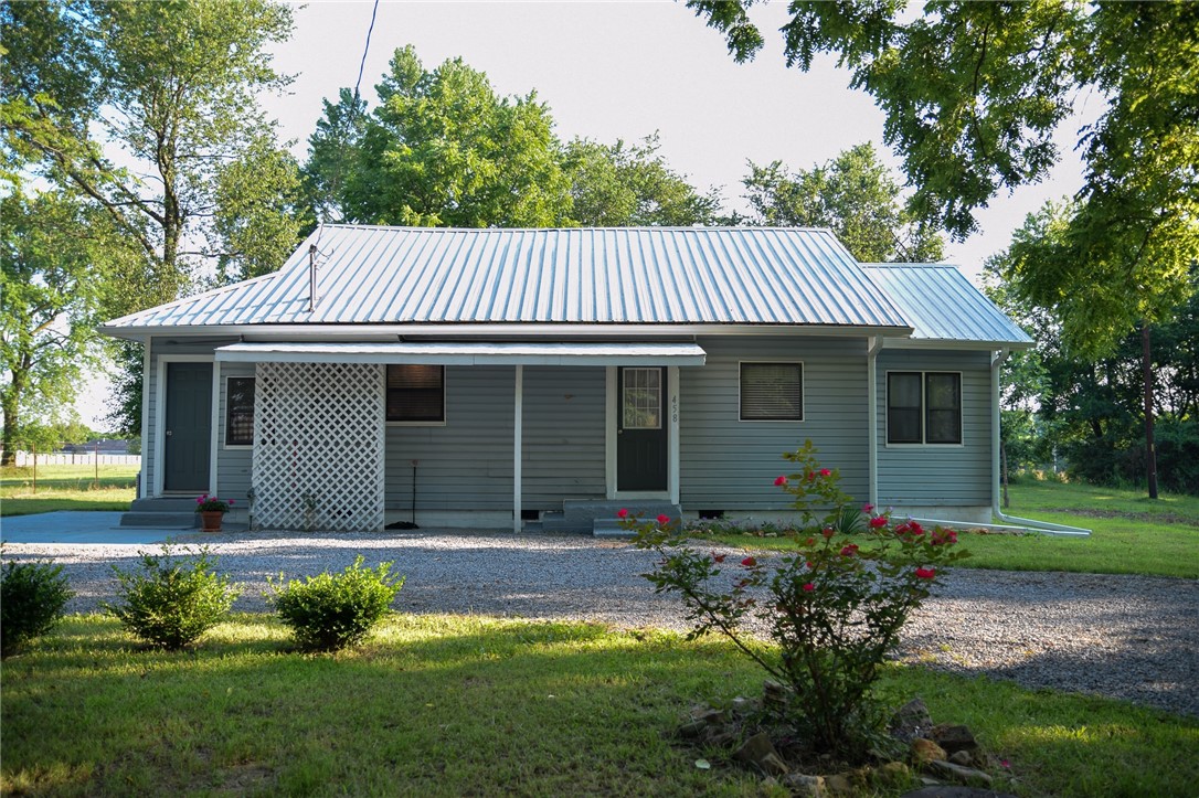 Country living within Decatur city limits. This cottage has been lovingly restored with new flooring, lighting on dimmers and paint throughout. Grow your own vegetables in the garden plot, collect fresh eggs from the chicken coop or enjoy the pasture view as you watch the sunsets. A large level yard surrounds the house with wooded area behind. New HVAC installed summer 2021 with 10 year warranty to convey to buyers. Refrigerator conveys. Being sold "as is" with no seller repairs