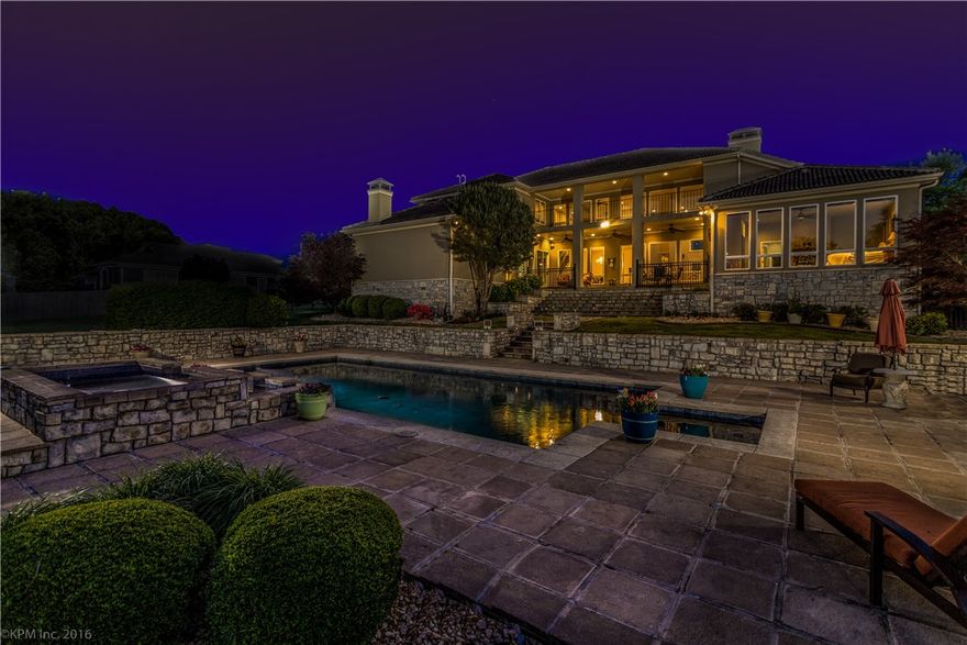 Museum District! Mediterranean style home surround by lush landscaping & features a gunite pool w/ multilevel waterfalls as focal point in resort-like backyard. Walking distance to Crystal Bridges,  Memorial & Orchard Park. Entering this home,  you are captivated by a wall of windows and incredible view. Master suite is your own personal oasis of tranquility with Italian tile, free standing tub and personal sauna. The large, open kitchen features SubZero fridge, Thermador appliances & custom cabinets.