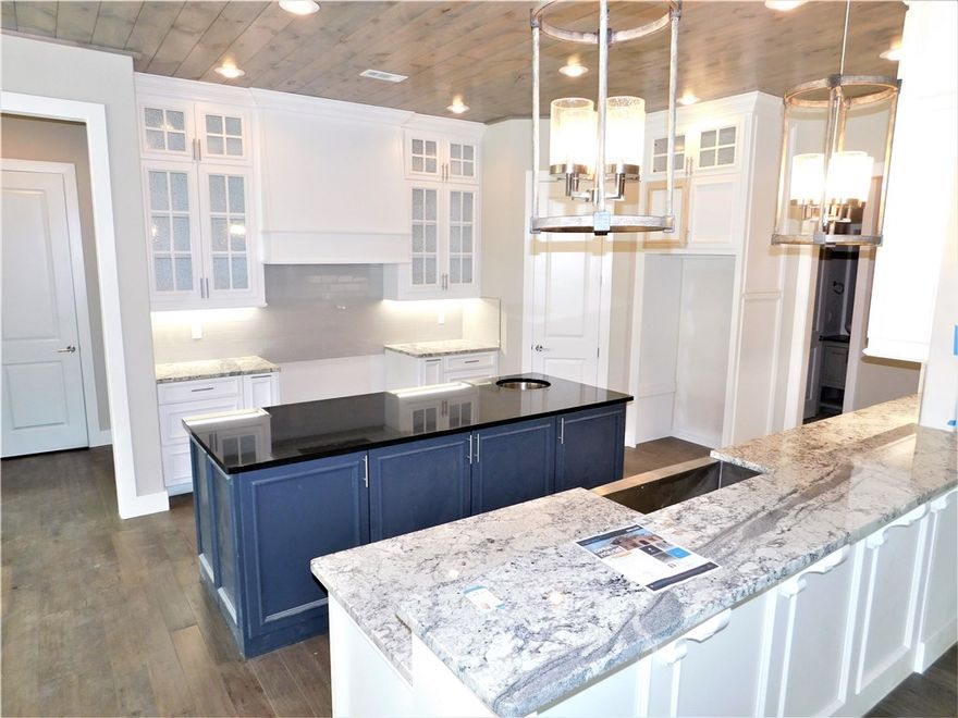 Gorgeous new construction home by JSN Properties! Located in Copper Ridge Community, this home boasts a fantastic floorplan and abundance of space. High-end features throughout including hardwood floors, granite tops & more. Formal dining room and Office/Study located off the entry. Spacious and open layout between living room and eat-in kitchen is perfect for entertaining! Guest bedroom on main level with private bath and WIC. Master suite has large attached bath with walk-in-shower and jacuzzi tub. Upstairs are the additional bedrooms. A secondary office or additional bedroom. A media/bonus room that could also be an additional guest bedroom. This home is a MUST SEE! Great location with easy access to all the very best of NWA. Welcome Home!