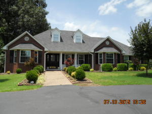 Located just past the golf course on Country Club Road, this home has new granite counters in kitchen, baths and laundry room, all new stainless still appliances, 25X26 garage,25X26 finished workshop, 2 asphalt,circle drives, private pergola covered deck and grill area, privacy fenced back yard, picket fenced 2.20 acres. Almost all windows are new triple pain.
