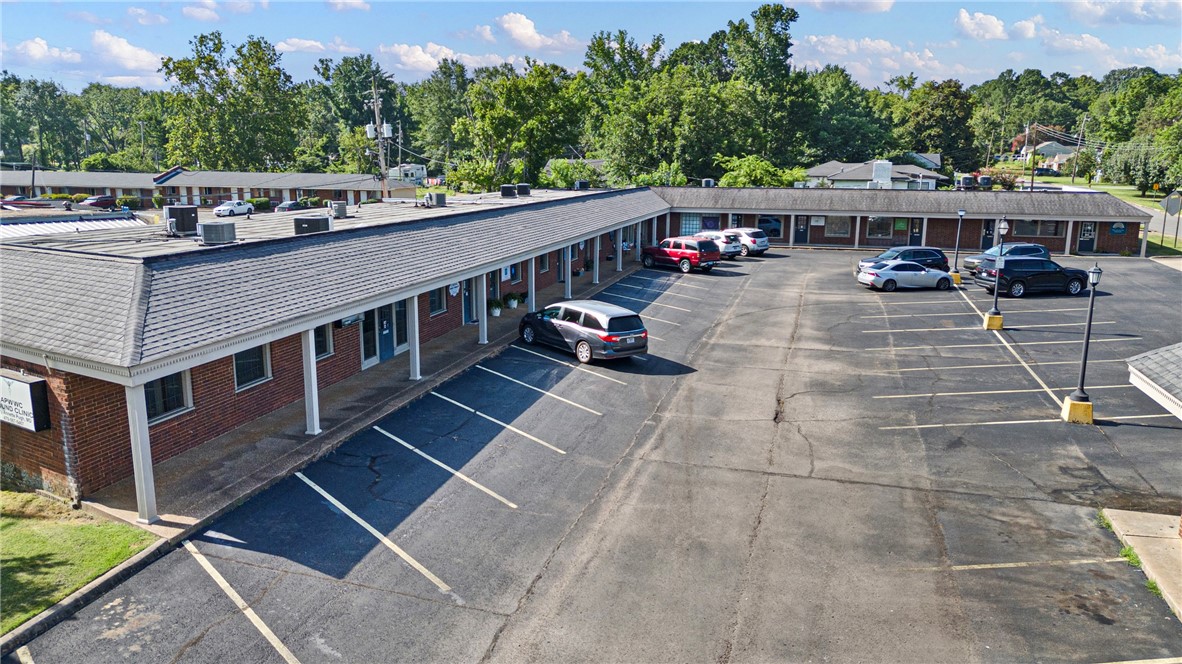 Located in the heart of West Russellville’s dense medical and professional office corridor, this well-maintained 12,000+ sq ft commercial complex offers a rare opportunity for both investors and owner-occupants.
The property features multiple established tenants, ample lighted parking, and flexible suite configurations ideal for a variety of professional, medical, or business uses. Surrounded by high-traffic offices, clinics, and service providers, the location offers excellent visibility and accessibility.
Whether you're looking to occupy a portion for your own practice or business while generating income from existing leases, or to add a stable asset to your commercial portfolio, this property delivers long-term value and potential.