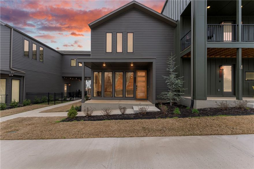 Tucked into one of East Fayetteville’s most walkable and growing neighborhoods, this nearly new home offers the easy & convenient lifestyle you've been looking for! Built just two years ago, the home feels fresh, yet has also received thoughtful upgrades throughout, including a reverse osmosis drinking water system, whole-home water softener, and upgraded thermostats. One feature that truly sets this home apart is the covered wooden deck, which is a rarity for Stage Station townhouses! This home sits just steps away from Confident Coffee, a local favorite, and Butterfield Trail Elementary. The neighborhood continues to grow as well, with a community pool opening this summer and pickleball courts following shortly behind! Whether you're looking for a primary residence or investment opportunity in an unbeatable location, this home is it! There will not be any more townhouses built in Stage Station, so jump on this rare opportunity while you can!