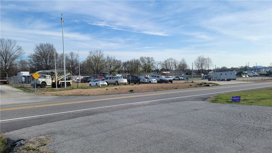 Look, Price reduced!!! Prime location on one of Pea Ridge's busiest streets!!! Approximately 412' of highway 72 frontage and 212' of Ellis St frontage. 2.01 acres. Just 1/2 block west of Wal-Mart Neighborhood Market and their new Zipline drone Service!!!!!  Would be great for most any types of commercial business. Come check this out.