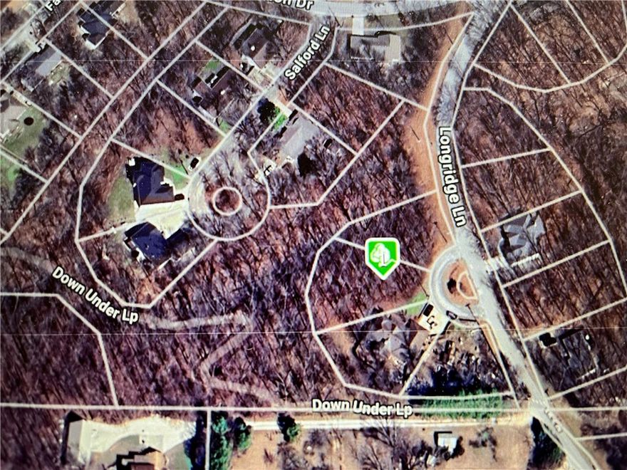The Down Under trail is directly behind the lot! .36-acre lot, mostly flat lot, perc tested up to (3) bedroom, paved road, partially wooded lot, quick access to Hwy 71 1.0 miles away, Bentonville School District, POA common property behind lot, Lakes, Golf Courses, and Trailheads nearby. Enjoy Amenities of Bella Vista POA Lot monthly fee $16 - allows access to (7) Lakes, (6) Golf Courses, (2) Outdoors Swimming Pools, (1) Indoors Swimming Pool, (3) Workout Centers, Tennis Courts, Pickleball Courts, Disc Golf, Gun Range, Golf Driving Range, Walking Trails, 100 Miles of Mountain Biking Trails, (1) Sandy Beach, Pro Golf Shops, Fishing Docks, and much more.