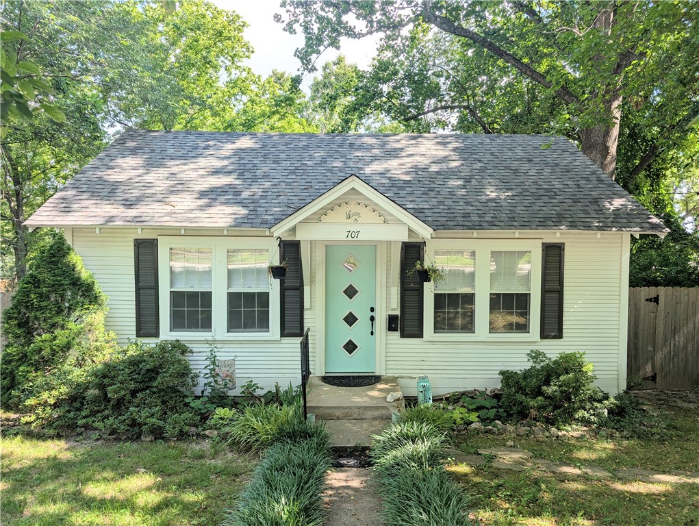 Step into over 1,000 sq ft of cozy charm in this beautifully updated 2-bedroom, 1-bath cottage! Enjoy peace of mind with updated PEX plumbing, great water pressure, a Rinnai tankless water heater, and a separate shut-off valve for washer/dryer lines. The bathroom boasts an updated toilet, sink, tub hardware, porcelain tile, and fresh ceiling trim.
The kitchen shines with butcher block counters, Spanish porcelain tile, new cabinets, sink, lighting, and floating shelves. Original tongue-and-groove walls and ceilings bring warmth and history, paired with modern updates like fresh paint, new doors, ceiling fans, dining room flooring, rain gutter, and a gas wall heater.
The fully fenced backyard is perfect for pets or gatherings. New front and back doors, termite prevention with Fitton Pest, and many thoughtful upgrades make this a move-in-ready gem!
Don’t miss your chance to own this super cute, nicely updated home!