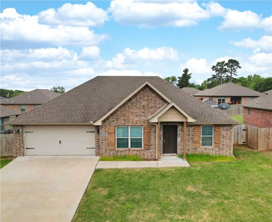 Beautiful home in Bentonville's Silver Meadows subdivision.  This all brick, three bedroom, two bath home features an open-concept layout with vaulted ceilings in the living room, granite countertops throughout, stainless appliances (including refrigerator), and engineered hardwoods in entry and living room.  Like new and move-in ready, this is a perfect opportunity for first-time home buyers or investors.