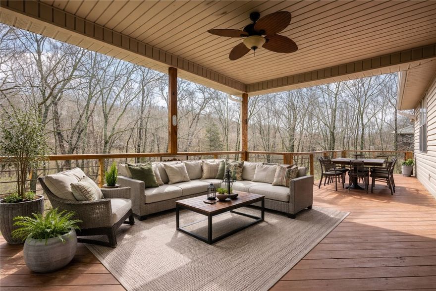 Located in one of Bella Vista’s most sought after outdoor corridors, this home offers direct access to the Snowbird section of the Back 40 Trail system just behind the property. Enjoy quick access to the golf course, Razorback Greenway, and nearby community amenities including a pool, playground, pickleball courts, golf, and a clubhouse, creating a true hub for active living.
The flexible floor plan features three bedrooms on the main level, an eat in kitchen, and a formal dining space that can easily serve as a home office. The walk out basement expands the living space with a large bonus room ideal for a gym, workshop, playroom, or media room, along with a fourth bedroom and ensuite bath.
Covered decks overlook a large, flat backyard surrounded by mature trees, offering wooded privacy, great curb appeal, and a peaceful bike friendly setting with direct trail access just steps away. SELLER IS OFFERING A $10,000 UPDATE ALLOWANCE.